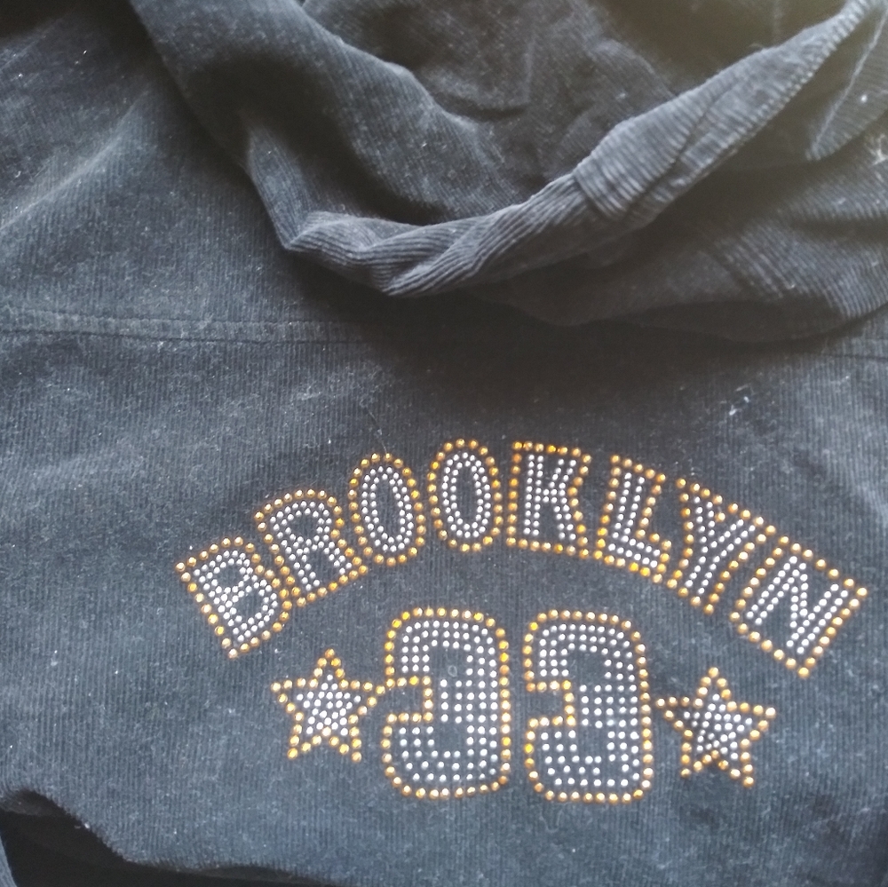 Brand is. AVAILABLE. SIZE-LARGE. BLACK CORDUROY.